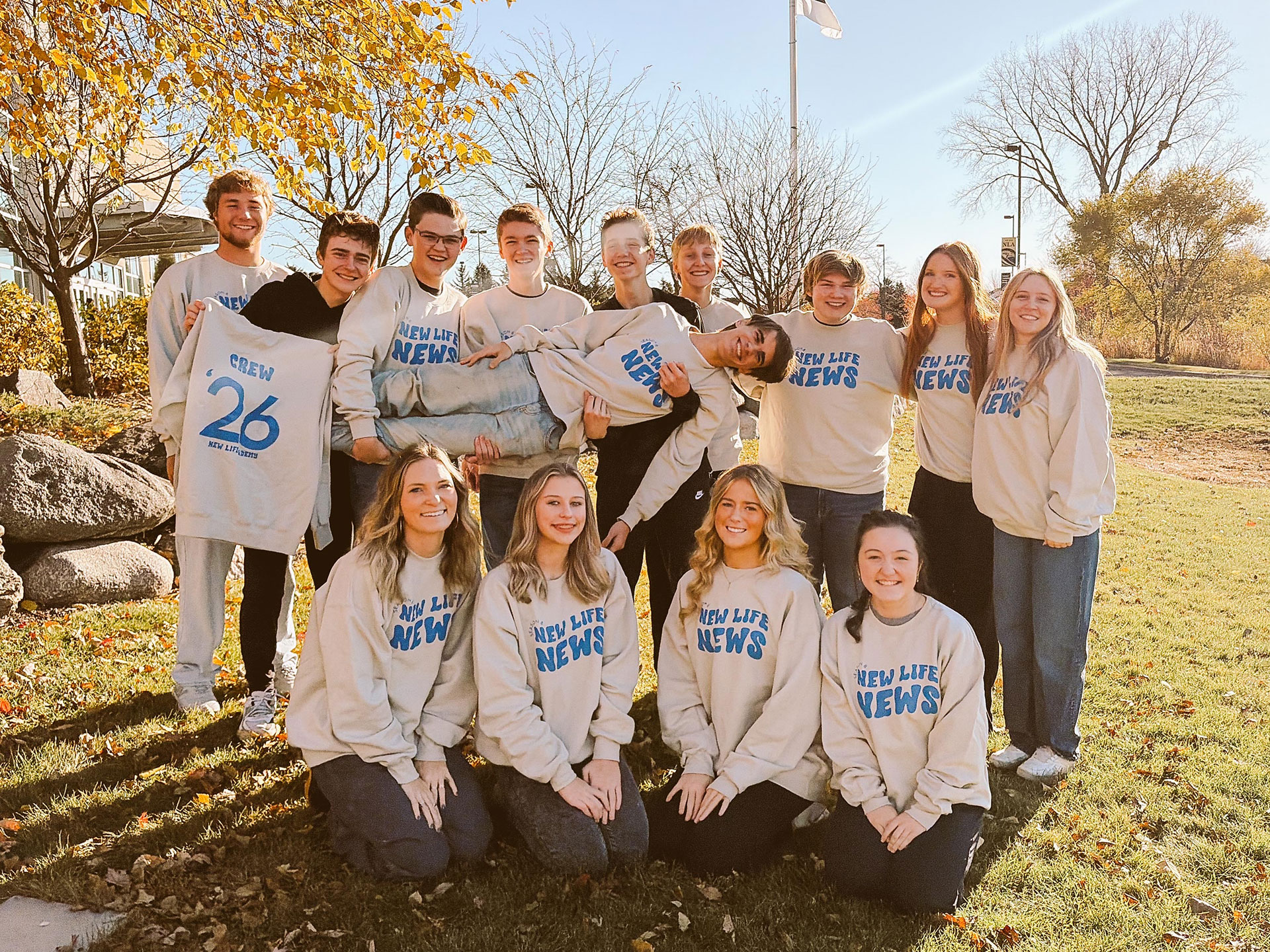New Life Academy students in New Life News sweatshirts